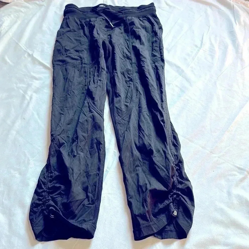 Lululemon black crop pants size 4 drawstring waist pockets pinstripe